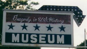 The Tragedy In The US Museum sign